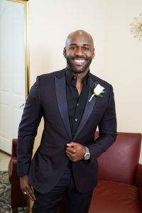 A handsome groom in his formal wear rented in Las Vegas.